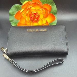 Michael Kors Black Wallet with Gold Zipper and brassware